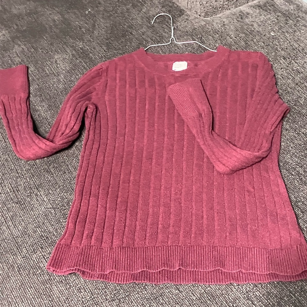 Dark maroon with purple in it.